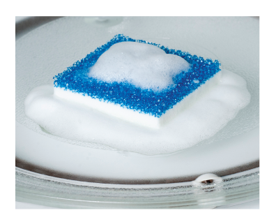 Glisten microwave cleaner scrubber foaming on glass turntable