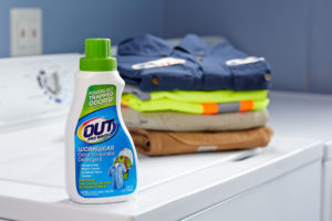 OUT ProWash clothes deodorizer detergent with work laundry on washer